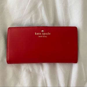 Kate Spade red wallet in excellent condition.